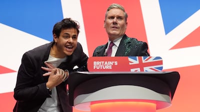 The protester shouts from the stage. PA