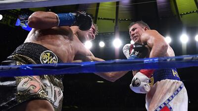 Sergiy Derevyanchenko punches Gennady Golovkin during their IBF middleweight title bout at Madison Square Garden. AFP