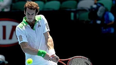 Andy Murray of Great Britain plays a backhand in his third round match against Guillermo Garcia-Lopez of Spain.