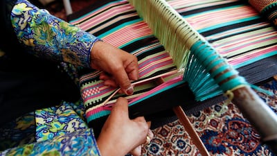 Weaving involves the interlacing of horizontal and vertical threads Sarah Dea / The National