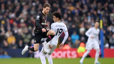Mathias Jensen of Brentford is challenged by Rodrigo Moreno of Leeds. Getty