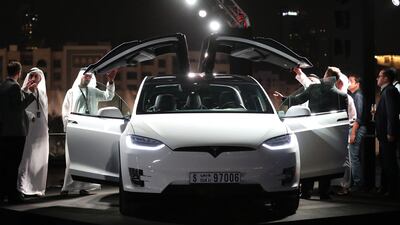 Tesla this month announced the opening of a new Arabian Gulf headquarters in Dubai. Karim Sahib / AFP