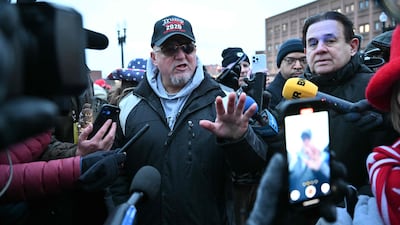 Oath Keepers founder Stewart Rhodes speaks to members of the media outside the DC Central Detention Facility where some defendants from the January 6, 2021 attack on the US Capitol are being held, in Washington, DC, on Tuesday. AFP