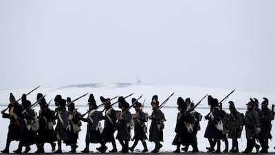 Czech history enthusiasts dressed as soldiers prepare for a re-enactment of Napoleon's Battle of Austerlitz, near the southern Moravian town of Slavkov u Brna. Reuters