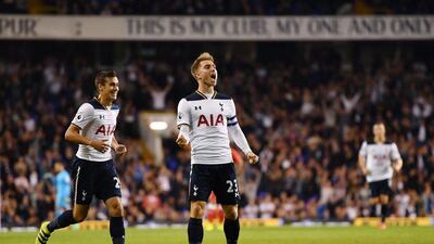 Christian Eriksen of Spurs celebrates scoring his side’s first goal with Harry Winks. Mike Hewitt / Getty Images
