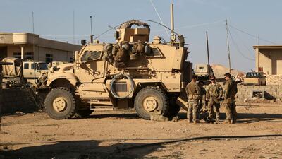 US soldiers seen on on a joint base with Iraqi army south of Mosul in 2017. AP