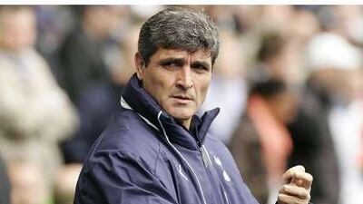 The Tottenham manager Juande Ramos says he is determined to stay in his job despite his side's poor start to the season.