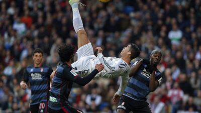 Cristiano Ronaldo attempts a bicycle kick on Saturday. Andres Kudacki / AP