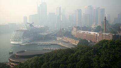 The Sydney Harbour and central business district are shrouded in haze. Bloomberg