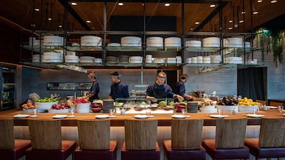 Chefs working at the live robata grill