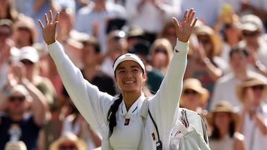 Alexandra Eala acknowledges the Centre Court crowd after losing to Jasmine Paolini at Wimbledon. Getty Images