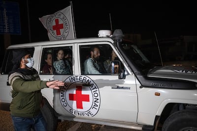 A Red Cross vehicle transports released Israeli hostages on November 25, 2023. AP Photo