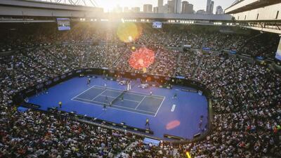 General view of a packed Rod Laver Arena with the skyline of Melbourne, during sunset at the Australian Open in Melbourne, Australia, 18 January 2016. Made Nagi / EPA