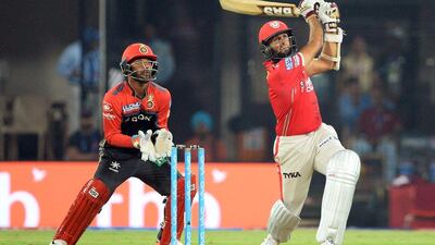 Hashim Amla's unbeaten half century led Kings XI Punjab to a comfortable victory against Royal Challengers Bangalore. Sajjad Hussain / AFP