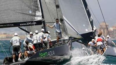 Team Aqua, left, in hot pursuit of a rival yacht in the waters off Valencia.