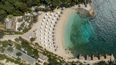 The 90-metre infinity pool at the five-star hotel in Kep Merli, Albania, blends in with the Mediterranean sea. Photo: Kep Merli