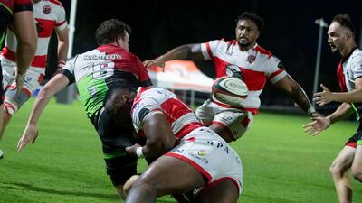 Harlequins and Tigers players in action at Zayed Sports City Rugby Fields. Ruel Pableo for The National