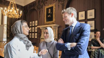 Noura Al Kaabi speaks with Dr Tristram Hunt, right, Director V&A; and Lubna Al Gergawi - Director of the Minister’s Office, at V&A boardroom. Eleanor Bentall for The National