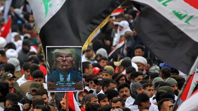 Protesters carry a caricature of US President Donald Trump. AFP