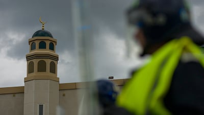 Riot police had to defend mosques across the UK during widespread disorder last summer. Getty Images
