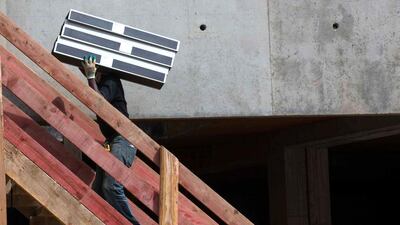 A worker at a construction site for a new building in Paris. Philippe Wojazer / Reuters