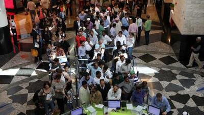 Long queues form at the Etisalat outlet in Mall of the Emirates, Dubai, ahead of a looming deadline for SIM card registrations.