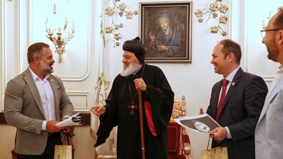 US Congressmen Cory Mills, left, and Marlin Stutzman, right, met Mor Ignatius Aphrem, the Patriarch of the Syriac Orthodox Church, in Damascus on Good Friday. AP