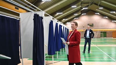 Danish Prime Minister and chairwoman of the Social Democratic Party Mette Frederiksen arrives at a polling station in Hareskovhallen, north of Copenhagen. AFP