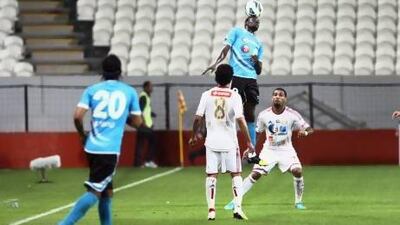 Andre Senghor of Baniyas goes up for a header against Al Jazira. Senghor hit a stoppage time goal to force a draw on Jazira and move Baniyas to the top of Group B by a point in the Etisalat Cup tournament.