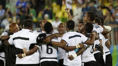Fiji celebrate their gold medal in rugby sevens at the Rio 2016 Olympics on Thursday night. Robert F Bukaty / AP Photo / August 11, 2016