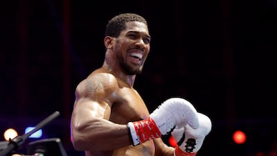 Anthony Joshua celebrates after winning his fight against Kristian Prenga by technical knockout. Reuters