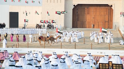 Audience members watch the Union March, during the Sheikh Zayed Heritage Festival. Mohamed Al Suwaidi for the Crown Prince Court - Abu Dhabi