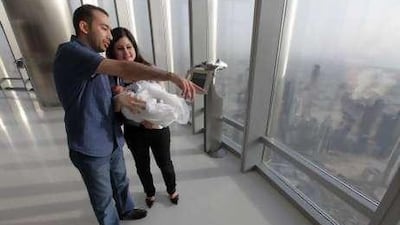 Amjad Hanna and Maram Haddad show Afif the view from the 124th floor.