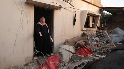 A neighbour said when they returned the home had been destroyed by the Israelis. AFP