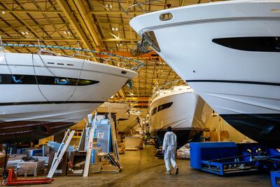 Hulls of yachts in a boat yard at the Princess Yachts Newport Street site. Bloomberg