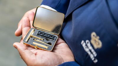 A gold razor is part of the ship's collection of memorabilia