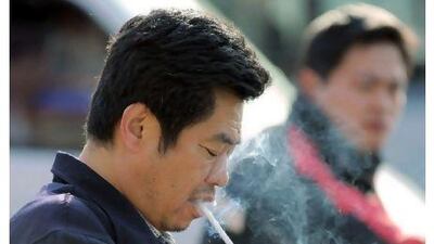 China launches a ban on smoking in indoor public spaces on May 1 but the effort is widely viewed as vague and half-hearted. Experts do not expect it to have much of an impact in the tobacco-addicted country.