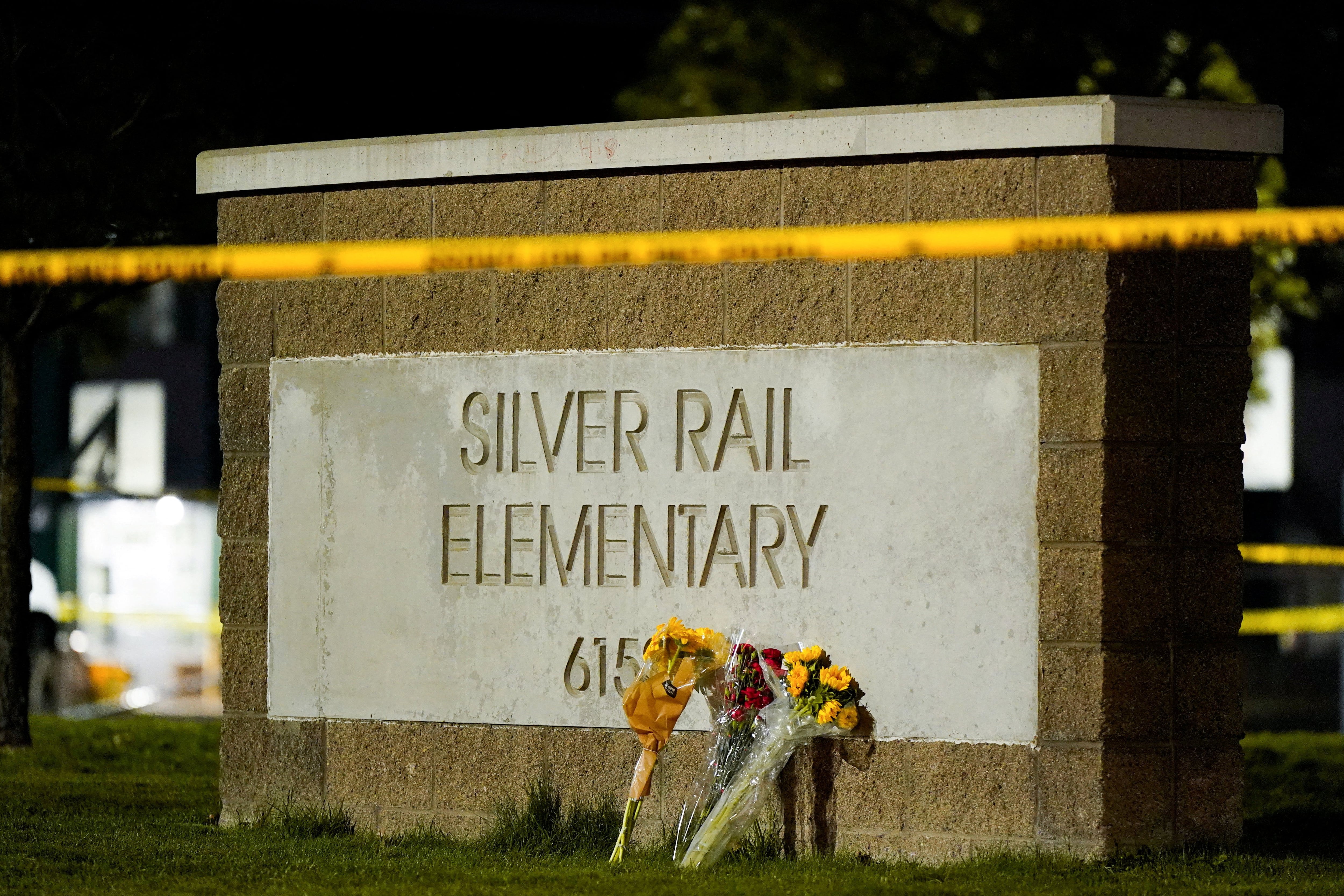 Flowers are placed outside Silver Rail Elementary School in Bend, Oregon. Reuters