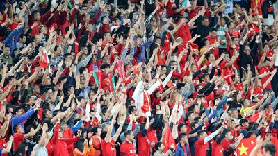 Fans of China celebrate after winning the 2019 AFC Asian Cup group C preliminary round match between Philippines and China in Abu Dhabi. EPA