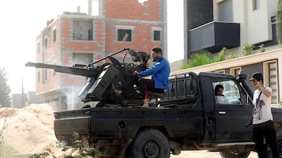 Anti-Libyan National Army fighters atop heavy weaponry in southern Tripoli. Reuters