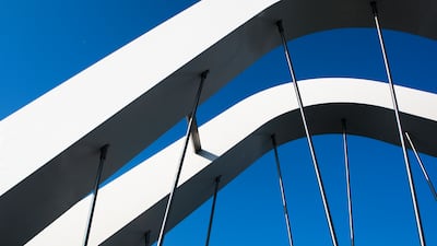 One of the three arches of Sheikh Zayed Bridge, inspired by the sand dunes of the desert and waves beneath. Pictured in October 2010, just before the bridge opened to traffic. Lee Hoagland/The National