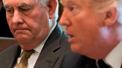 US secretary of state Rex Tillerson listens as president Donald Trump speaks during a cabinet meeting at the White House on October 16, 2017. Saul Loeb / AFP
