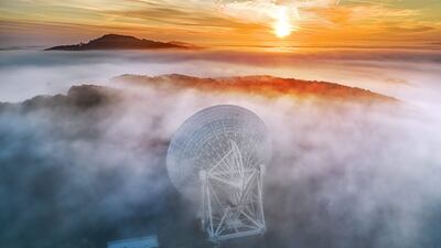 The Max Planck Institute for Radio Astronomy's Effelsberg radio telescope, near Bad Munstereifel, in western Germany. Astronomers announced on Thursday that they have found evidence of gravitational waves that create a 'background hum' throughout the universe. AFP