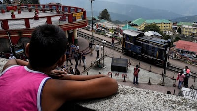 An engine belonging to the Darjeeling Himalayan Railway leaves a station in Darjeeling.