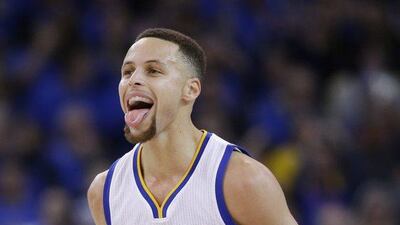 Golden State Warriors guard Stephen Curry celebrates a basket against the San Antonio Spurs on Monday night during his team’s NBA victory. Mario Jose Sanchez / AP