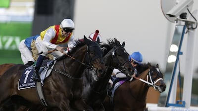 Jockey Connor Beasley and Native Approach on their way to victory in the Al Qouz Sprint. EPA