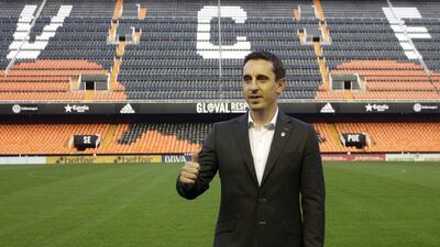 Valencia's new coach Gary Neville gives a thumbs up during his presentation at the Mestalla on Thursday. Heino Kalis / Reuters / December 3, 2015