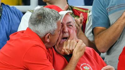 Wales fans celebrate as Josh Adams scores his sides first try during the 2019 Rugby World Cup Semi Final match at International Stadium Yokohama. PA Photo