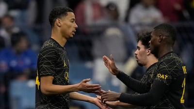 PSG's Hugo Ekitike (l) celebrates after scoring their fifth. AP