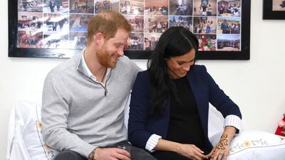 Prince Harry and Meghan, Duchess of Sussex, in an Alice + Olivia blazer, visit the Education For All boarding house in Asni Town in Morocco, on February 24, 2019. AP